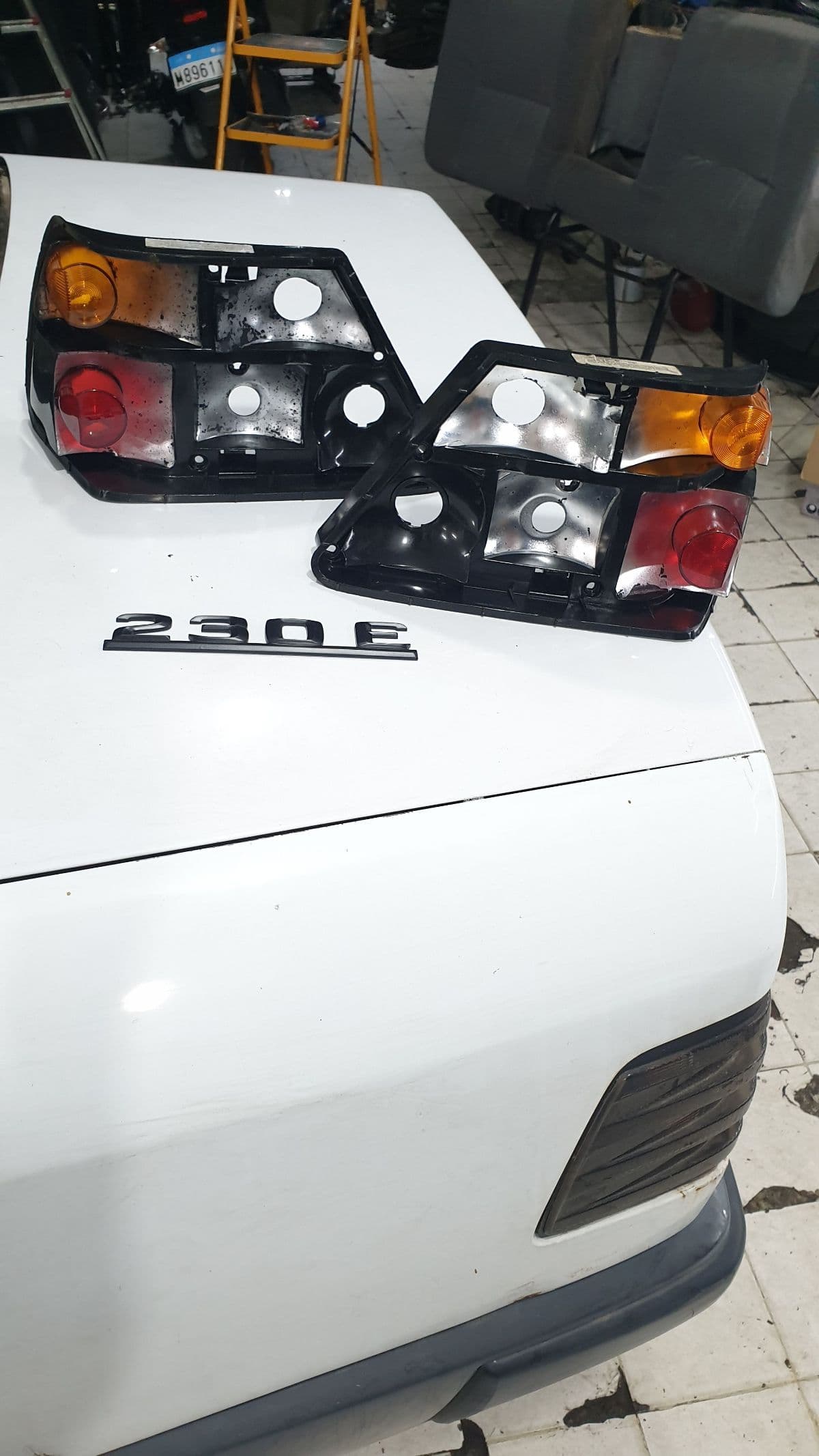W124 HELLA smoked tailight inserts left and right