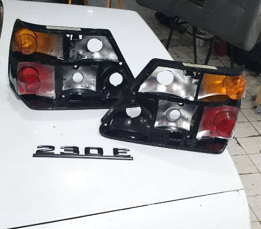 W124 HELLA smoked tailight inserts left and right